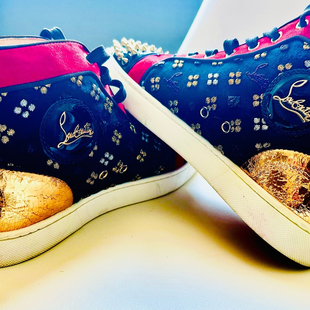 Christian Louboutin | ‘Lou Spike’ | High top Studded Sneakers